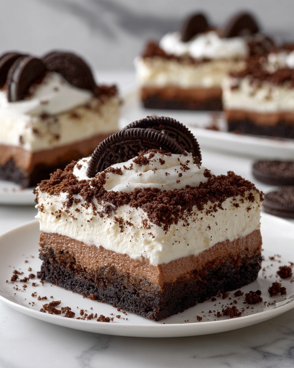 The dessert shows four clear layers in a glass dish on a white marbled surface. The bottom layer is a thick, dark brown crust that looks firm and crumbly. Above this is a white creamy layer mixed with small dark cookie bits. The third layer is a smooth, light brown chocolate cream that looks soft and fluffy. The top layer is a thick white cream covered evenly with finely crushed dark brown cookie crumbs. A square piece has been removed, revealing the clean edges and distinct layers. photo taken with an iphone --ar 4:5 --v 7