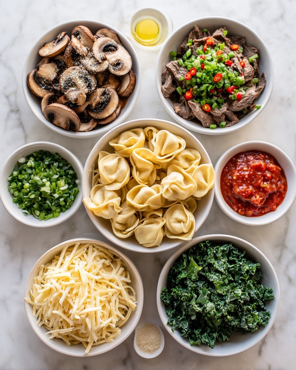 In the center, a white bowl holds a pile of raw tortellini, pale yellow with a soft, slightly wrinkled texture. Surrounding this are eight smaller white bowls arranged in a circular pattern on a white marbled surface. At the top left bowl, sliced brown mushrooms with a shiny texture are sprinkled with a light seasoning. Next to it is a small bowl of clear light yellow oil. The top right bowl contains cooked sliced beef topped with chopped green onions and small red chili pieces in a reddish sauce. Below it is a bowl of chunky red tomato sauce. Moving clockwise, a bowl of fresh green spinach leaves with a slight shine is visible. At the bottom center, a bowl fills with shredded pale yellow cheese. To its left is a bowl of dark green kale with a slightly wilted, glossy look. Above it is a bowl of chopped green herbs sprinkled with white bits, likely garlic or salt. photo taken with an iphone --ar 4:5 --v 7