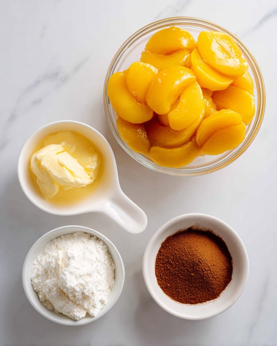 A flat lay image shows four main items on a white marbled surface: a clear glass bowl filled with two packs of bright yellow sliced peaches in syrup at the top right, a small white measuring cup with 3/4 cup melted butter with a smooth shiny texture to the bottom left of the peaches, a white packet of vanilla cake mix with soft folds positioned below the butter, and a small white bowl holding a heap of brown cinnamon powder at the bottom right corner. The bowls and containers are neatly spaced, and the text labels are placed directly over each item in a bold, casual handwritten style. Photo taken with an iphone --ar 4:5 --v 7