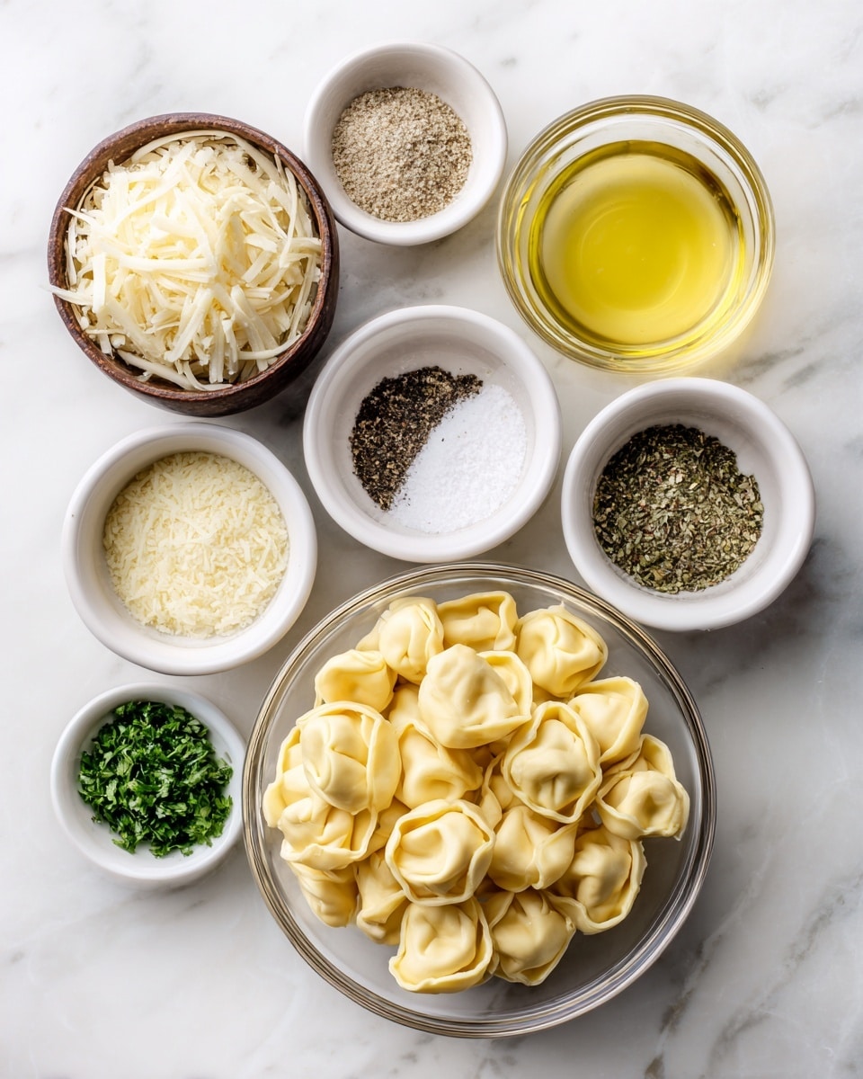 A top view of seven small white bowls and one clear bowl on a white marbled surface, each filled with different ingredients and labeled with black text. The clear bowl at the bottom holds 9 ounces of pale yellow cheese tortellini, round and folded in shape. Above it to the left is a small brown bowl filled with finely shredded pale off-white parmesan cheese. To the right of the parmesan is a small clear bowl with light yellow olive oil. Surrounding these are five white bowls holding seasonings: coarse white kosher salt, dark speckled black pepper, pale yellow garlic powder, mixed green dried Italian seasoning, and bright green chopped fresh parsley. photo taken with an iphone --ar 4:5 --v 7