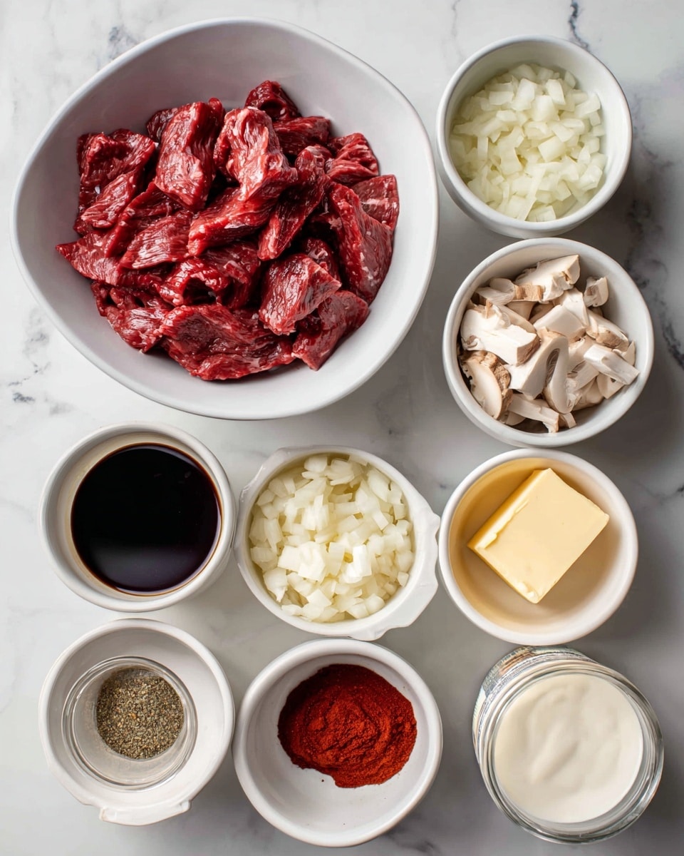 The image shows a top view of eight white bowls and one container arranged on a white marbled surface. The largest white bowl in the center holds raw beef strips that are red and slightly shiny. Surrounding it are smaller white bowls containing different ingredients: chopped white onion pieces, sliced white mushrooms, a thick red paste, a dollop of pale yellow mustard, a stick of light yellow butter, dark brown Worcestershire sauce in liquid form, and red paprika powder in a small mound. On the right side, there is a white container of sour cream with a visible label. At the bottom left, there is a small carton of beef stock liquid. Each item is clearly separated and neatly placed for easy viewing photo taken with an iphone --ar 4:5 --v 7