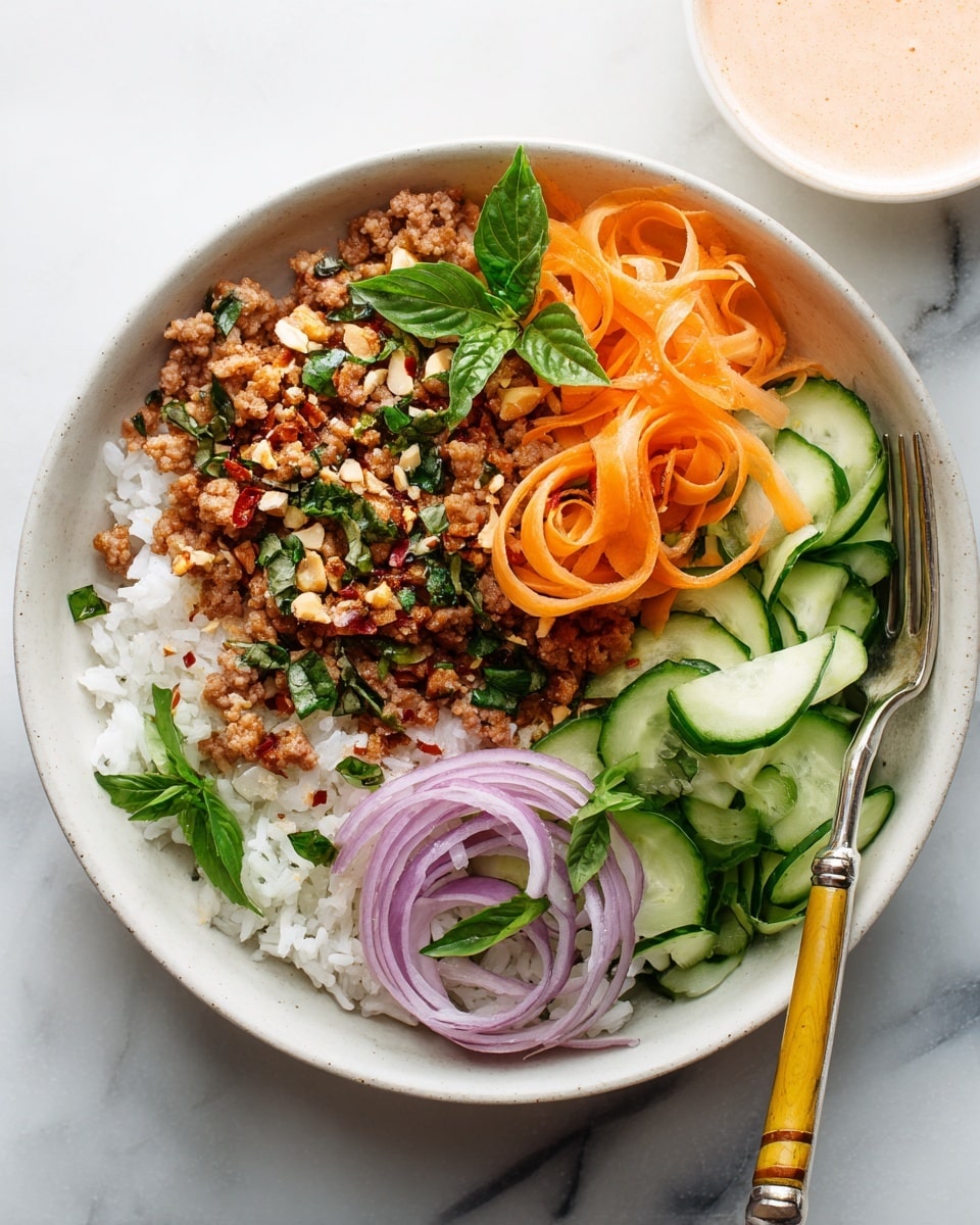 A white oval plate on a white marbled surface holds a layered meal starting with a base of white rice. On top of the rice, there is a layer of crumbled cooked meat mixed with herbs and small pieces of nuts, giving a textured brown and green appearance. To one side of the plate, there is a mix of thin, curled ribbons of orange carrot and green cucumber, along with some slices of light purple shallots, adding fresh color and crisp shapes. A small wooden bowl with a thick light brown sauce sits on the plate’s edge. A woman’s hand holds a fork with a bamboo-style handle, resting on the plate’s edge. In the background, there is a clear glass bowl with more ribboned vegetables and a clear textured glass of water. Photo taken with an iphone --ar 4:5 --v 7